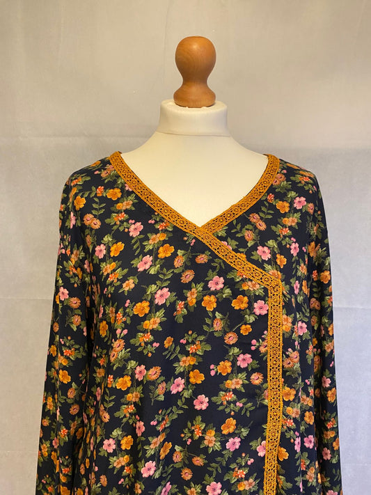 TRADITIONAL LOOKING FLORAL KURTA WITH MATCHING BOTTOMS.