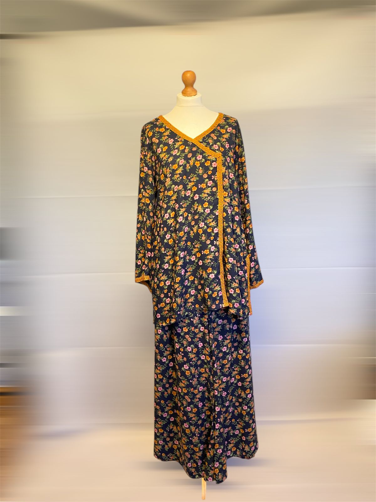 TRADITIONAL LOOKING FLORAL KURTA WITH MATCHING BOTTOMS.