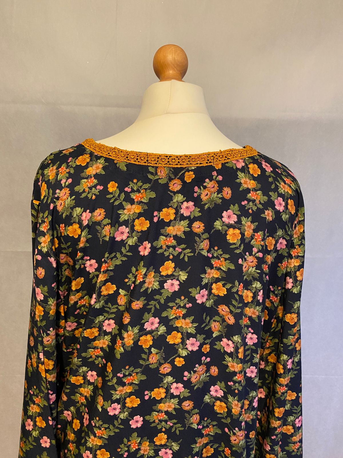 TRADITIONAL LOOKING FLORAL KURTA WITH MATCHING BOTTOMS.